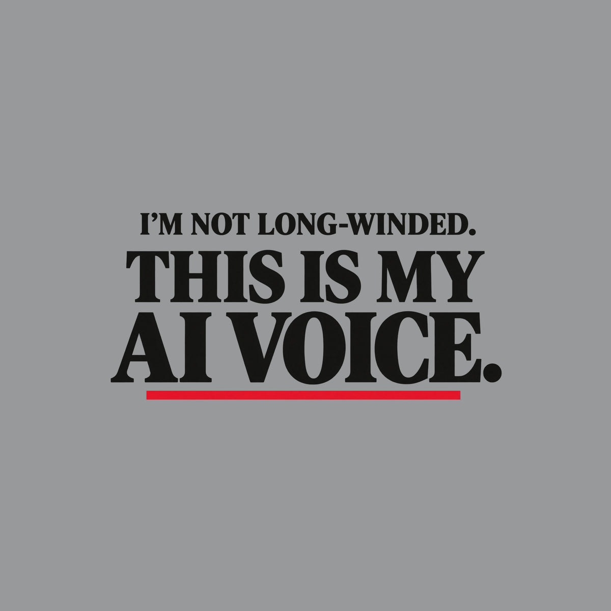 Black artwork with white serif type reading 'I'M NOT LONG-WINDED.' on a smaller upper line and 'THIS IS MY AI VOICE.' in much larger type below, underlined once in muted red. Artwork shown on the Sport Grey garment colour.