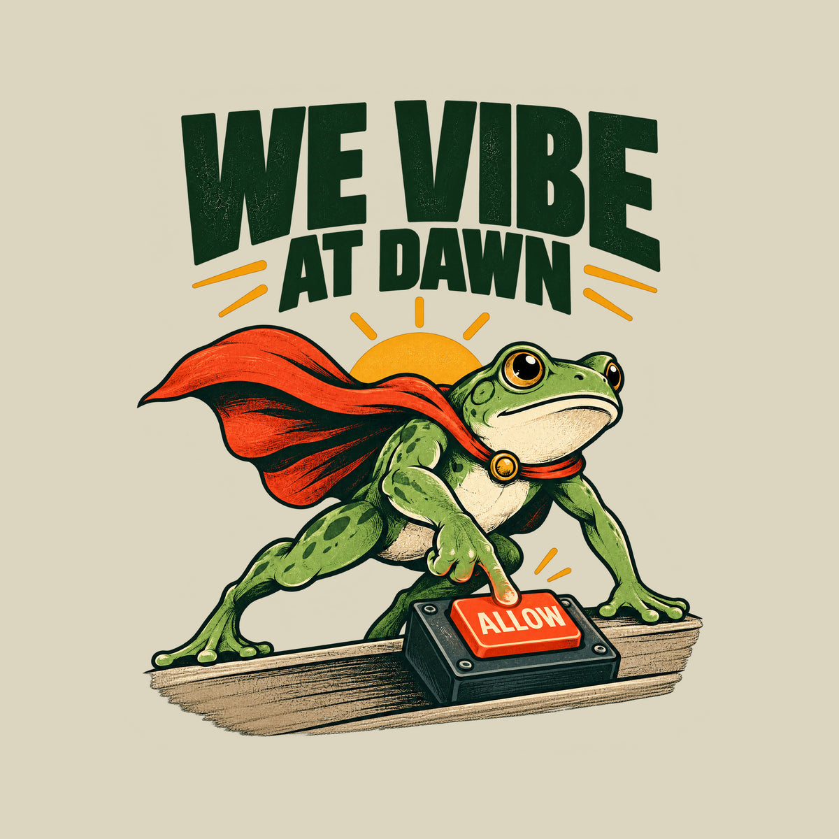 Illustration of a green frog in a red cape pressing a glowing red "ALLOW" button on a small desktop controller, with a rising sun behind it and the bold headline "WE VIBE AT DAWN" above, on a plain cream background. Artwork shown on the Natural garment colour.